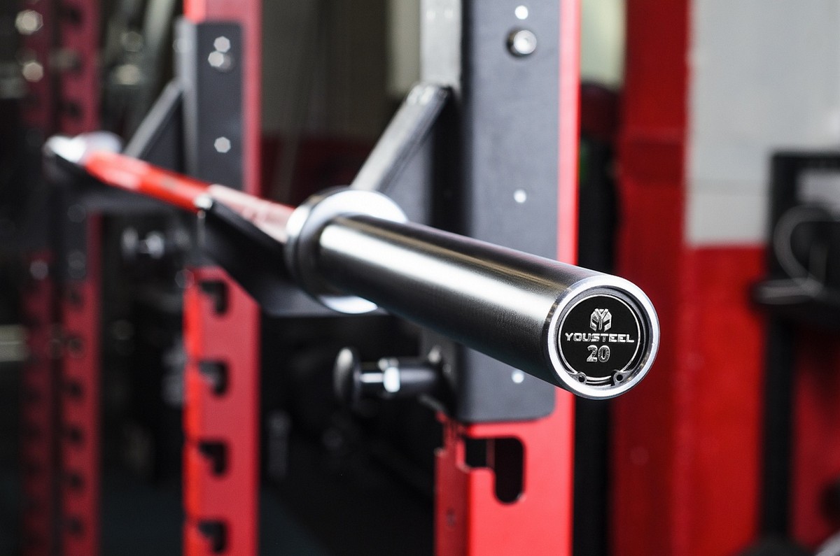 фото Гриф yousteel training bar xf-20, 20 кг, длина 2200 мм, d28 мм, красный + хром